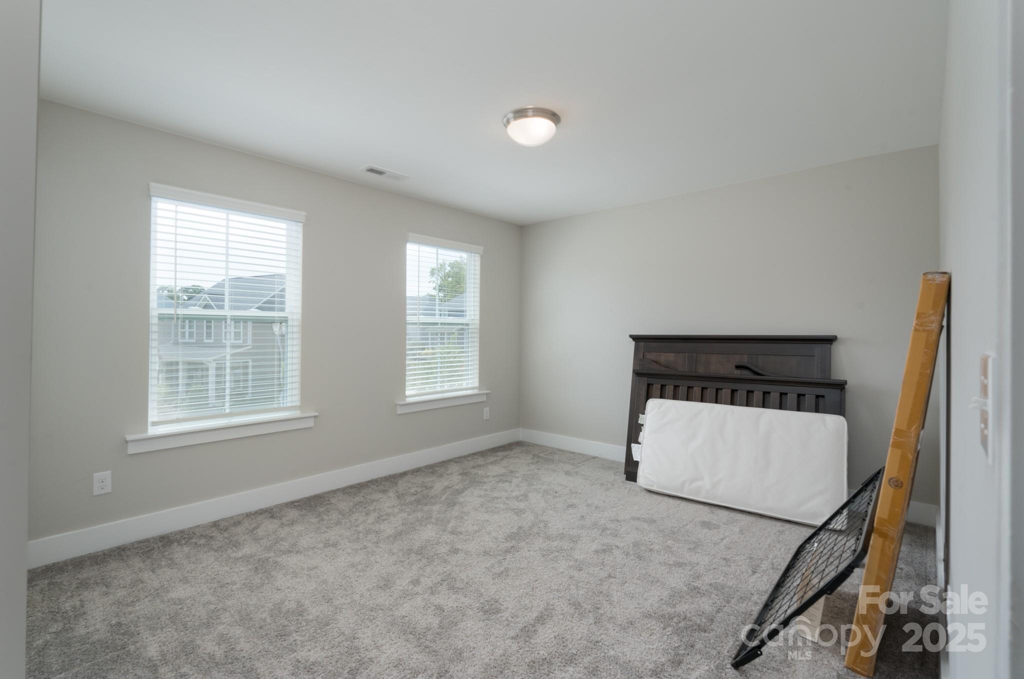 1180 Weir Court Fort Mill, SC 29708 - Photo 29 of 37 an empty room with windows