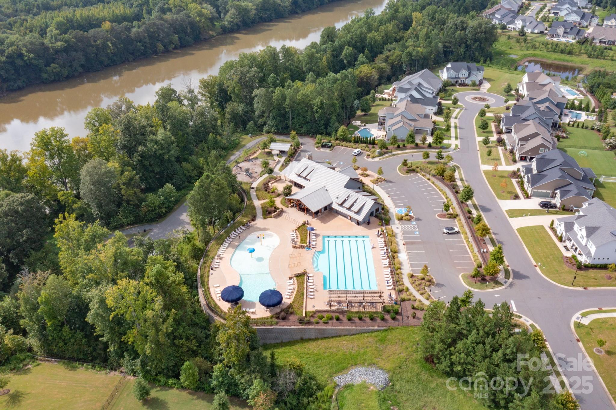 1180 Weir Court Fort Mill, SC 29708 - Photo 34 of 37 an aerial view of a house with a lake view