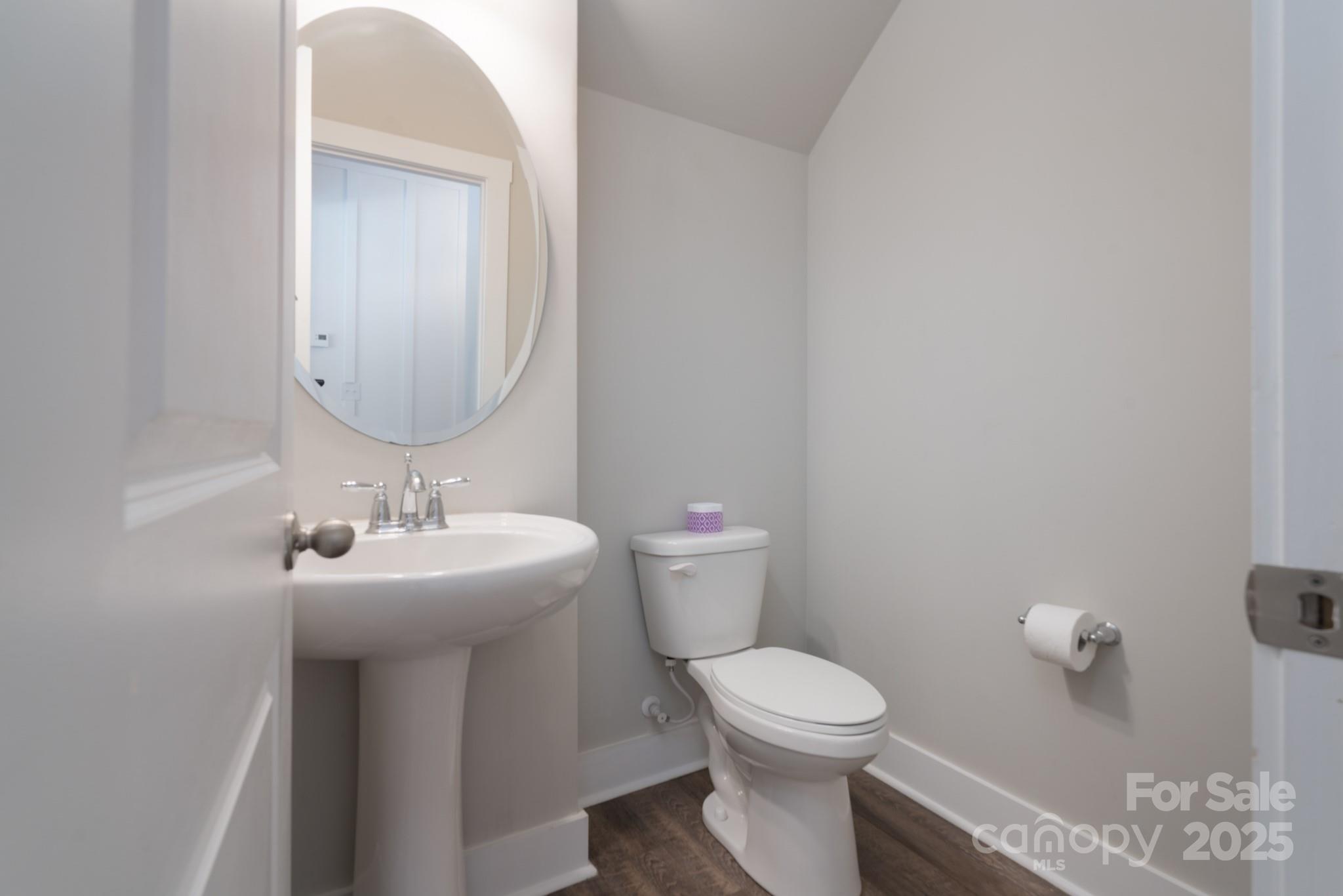 1180 Weir Court Fort Mill, SC 29708 - Photo 7 of 37 a bathroom with a toilet sink and mirror