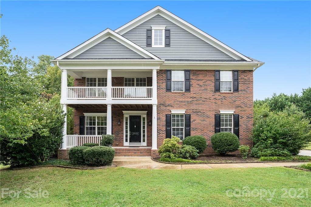1416 Shade Tree Court Matthews, NC 28104 - Photo 1 of 22 a front view of a house with a yard
