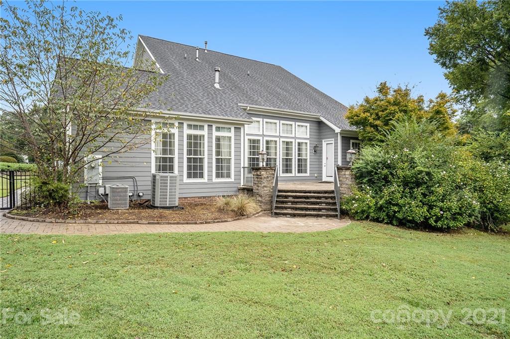 1416 Shade Tree Court Matthews, NC 28104 - Photo 5 of 22 a view of a house with a yard and sitting area