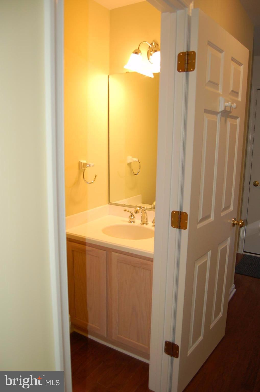 7414 Station Road Newcomb, MD 21653 - Photo 6 of 30 Foyer with powder room