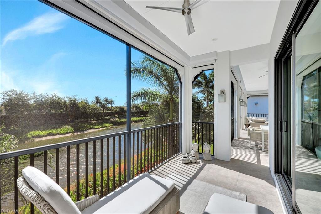16350 Corsica Way, Unit 202 Naples, FL 34110 - Photo 12 of 39 a view of balcony with couch