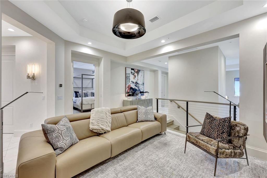 16350 Corsica Way, Unit 202 Naples, FL 34110 - Photo 20 of 39 a living room with furniture
