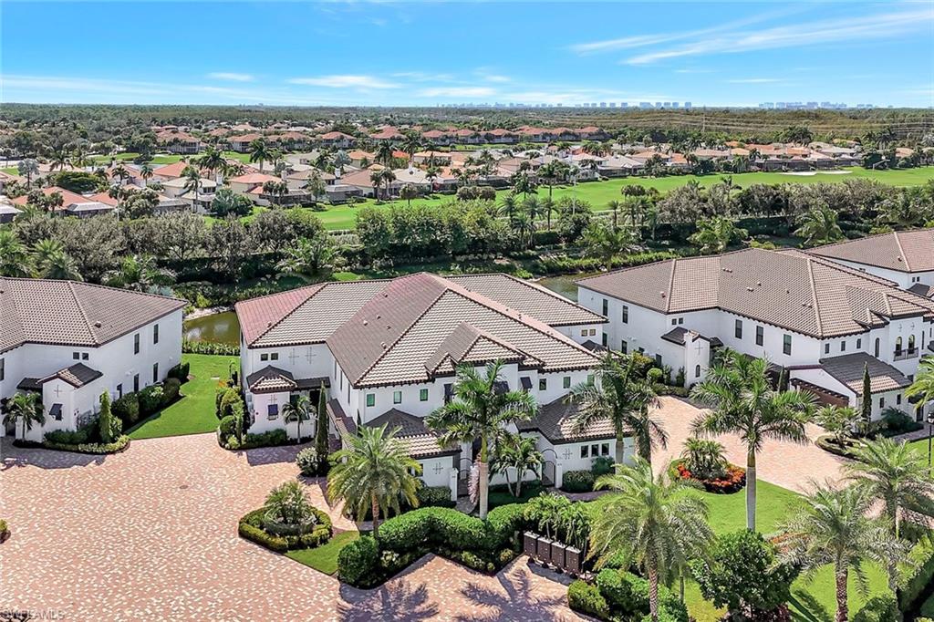 16350 Corsica Way, Unit 202 Naples, FL 34110 - Photo 35 of 39 an aerial view of multiple house