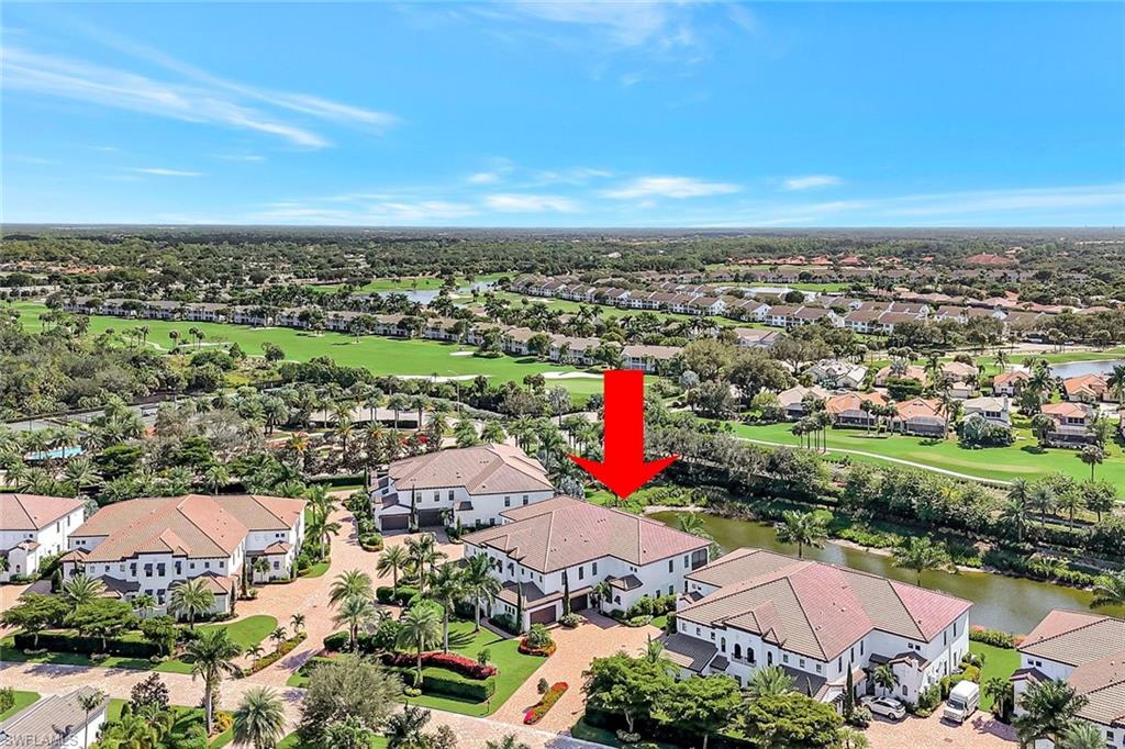 16350 Corsica Way, Unit 202 Naples, FL 34110 - Photo 39 of 39 an aerial view of residential houses with outdoor space and ocean view
