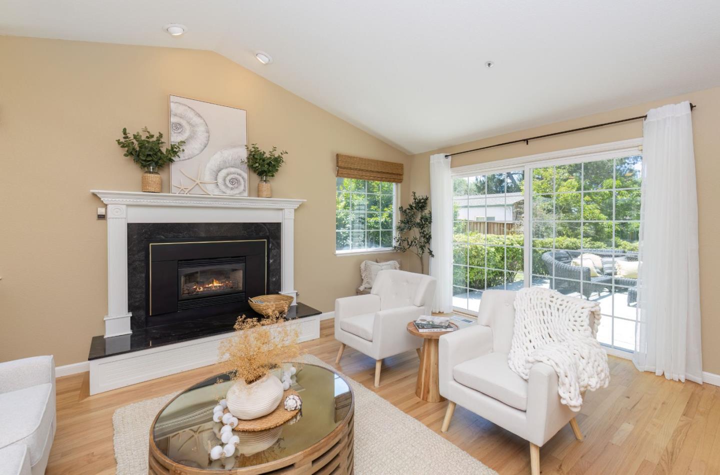123 Reed Way Santa Cruz, CA 95060 - Photo 1 of 39 a living room with furniture and a fireplace