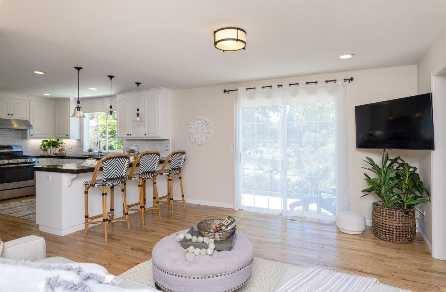 123 Reed Way Santa Cruz, CA 95060 - Photo 11 of 39 a kitchen with a table and chairs