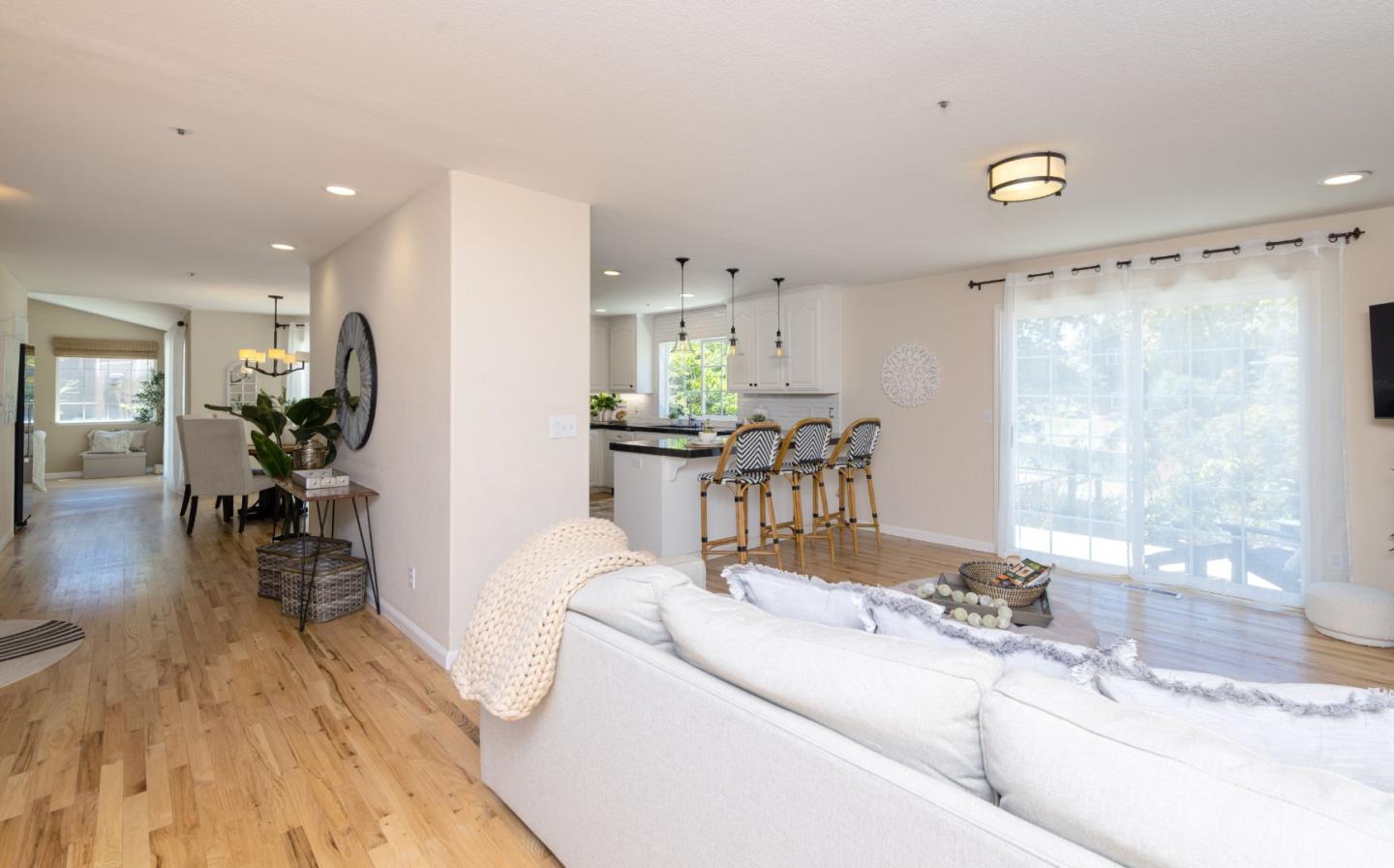 123 Reed Way Santa Cruz, CA 95060 - Photo 13 of 39 a living room with kitchen island furniture and a table