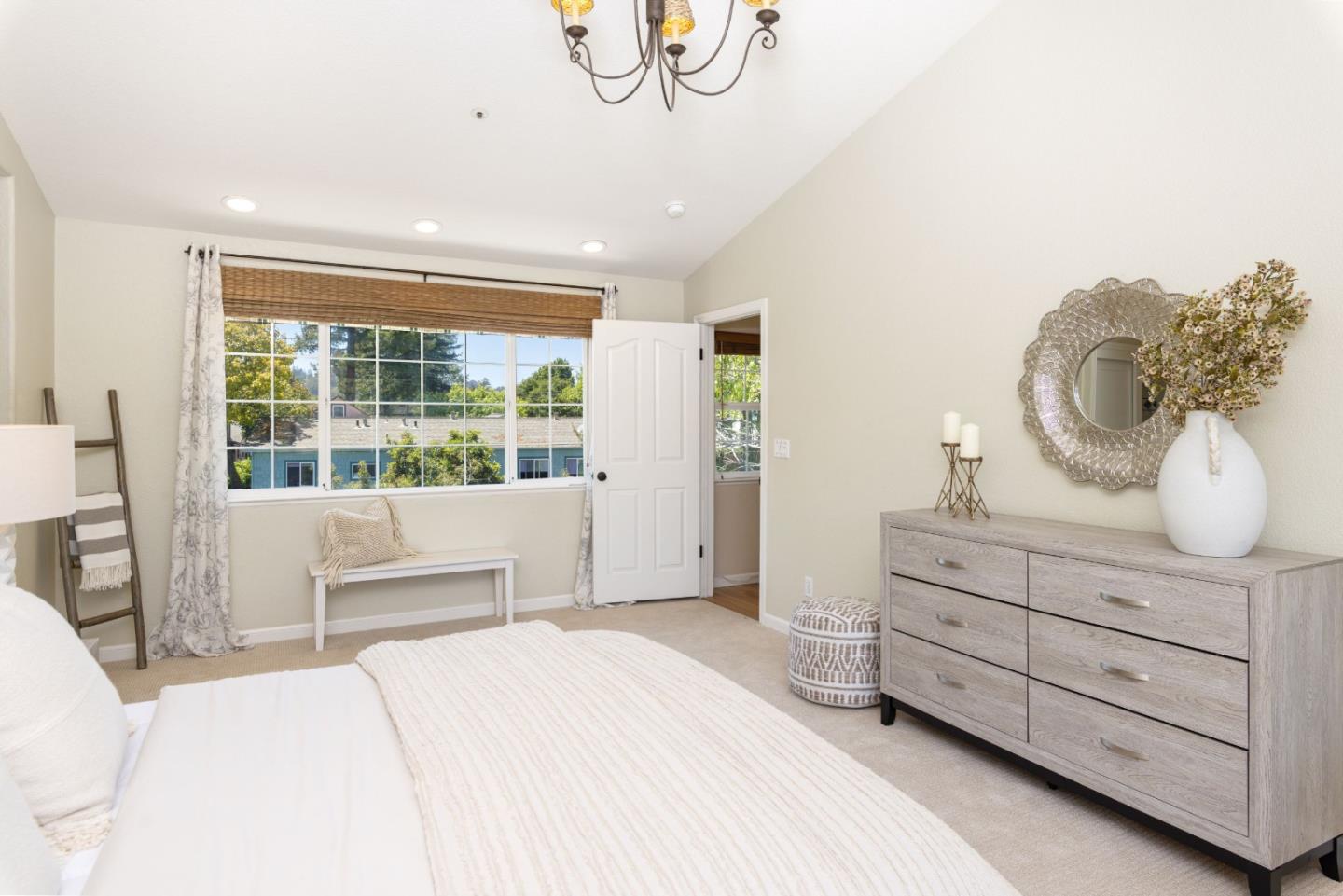 123 Reed Way Santa Cruz, CA 95060 - Photo 15 of 39 a bedroom with a large bed and a window