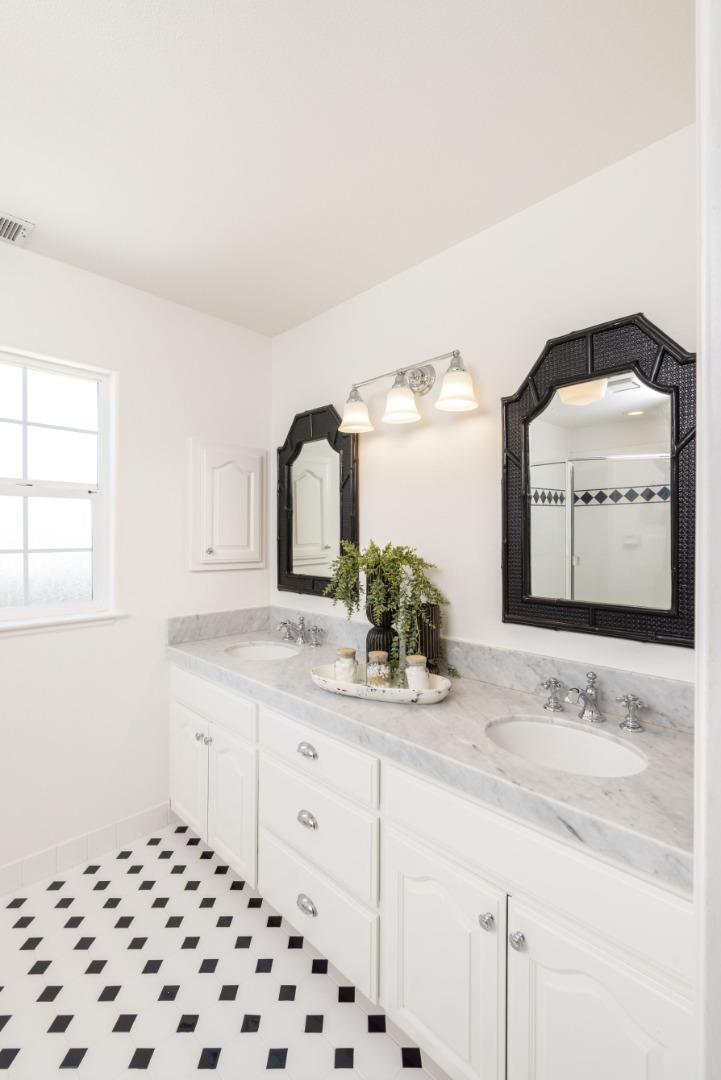 123 Reed Way Santa Cruz, CA 95060 - Photo 17 of 39 a bathroom with a sink and a mirror