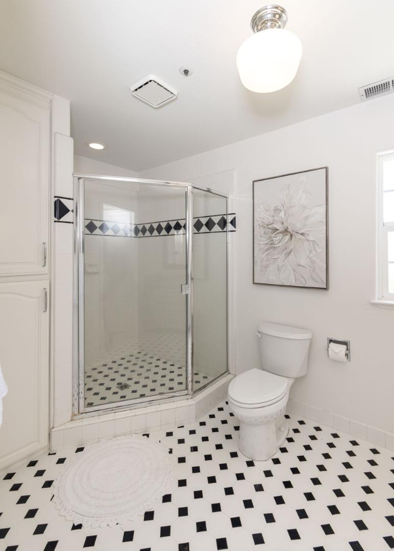 123 Reed Way Santa Cruz, CA 95060 - Photo 18 of 39 a bathroom with a shower toilet and sink
