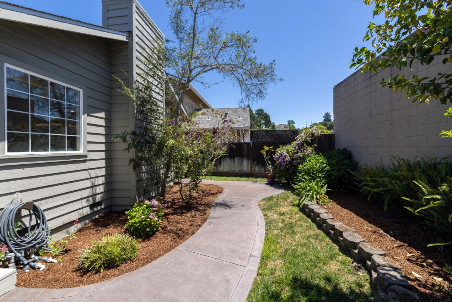 123 Reed Way Santa Cruz, CA 95060 - Photo 30 of 39 a view of a house with a yard and garden