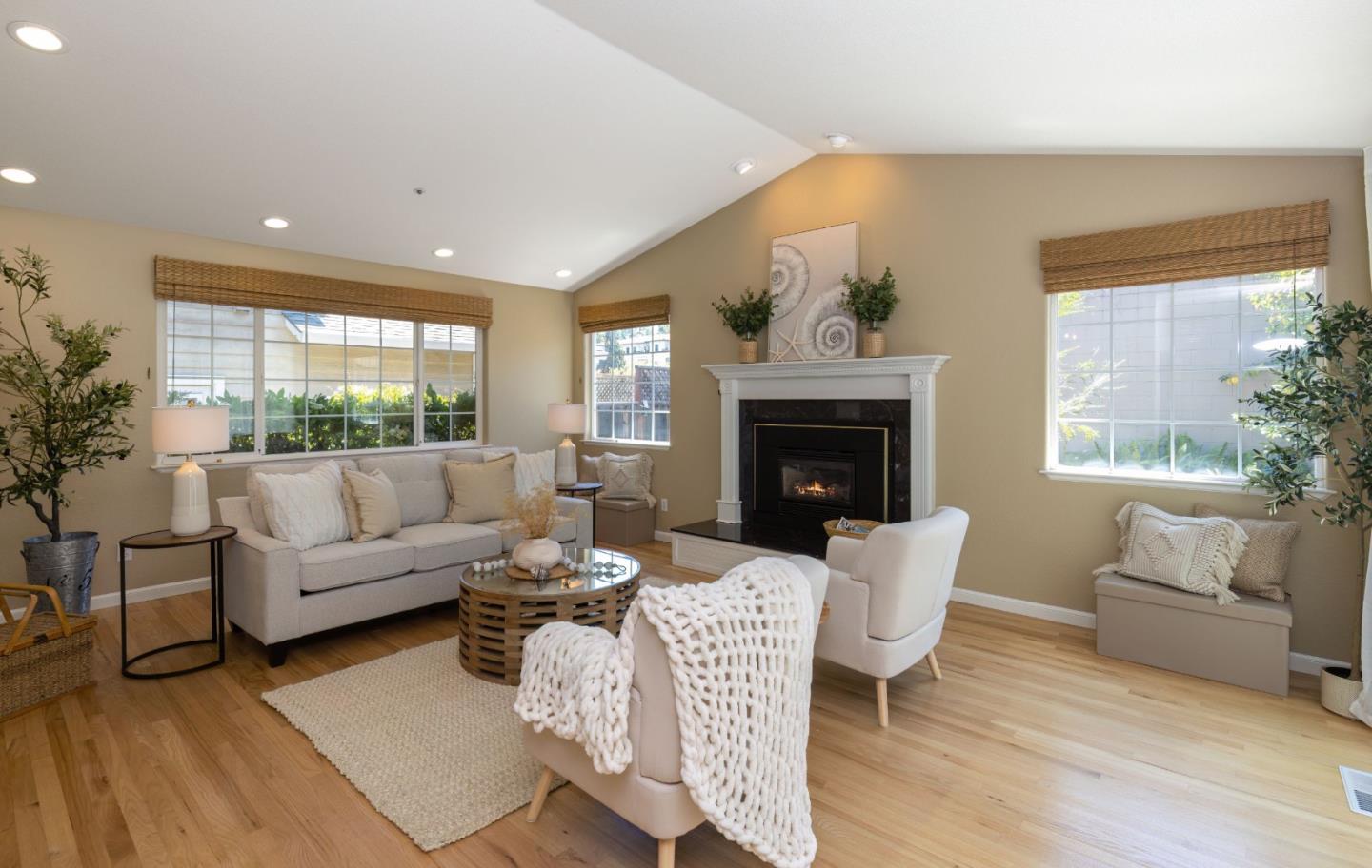 123 Reed Way Santa Cruz, CA 95060 - Photo 6 of 39 a living room with furniture a fireplace and a large window