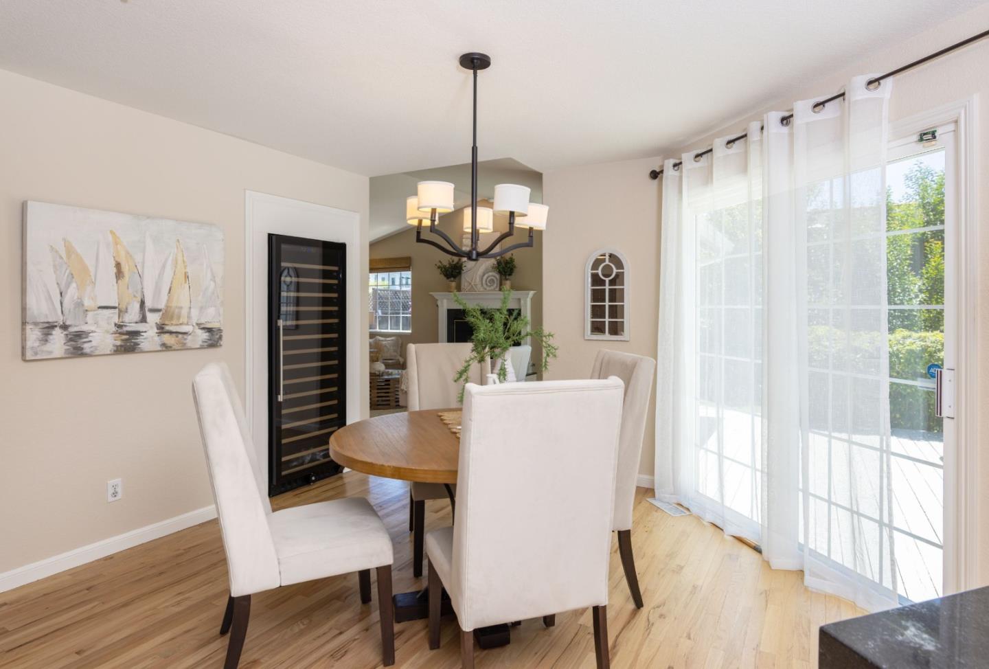 123 Reed Way Santa Cruz, CA 95060 - Photo 7 of 39 a dining room with furniture a chandelier and wooden floor