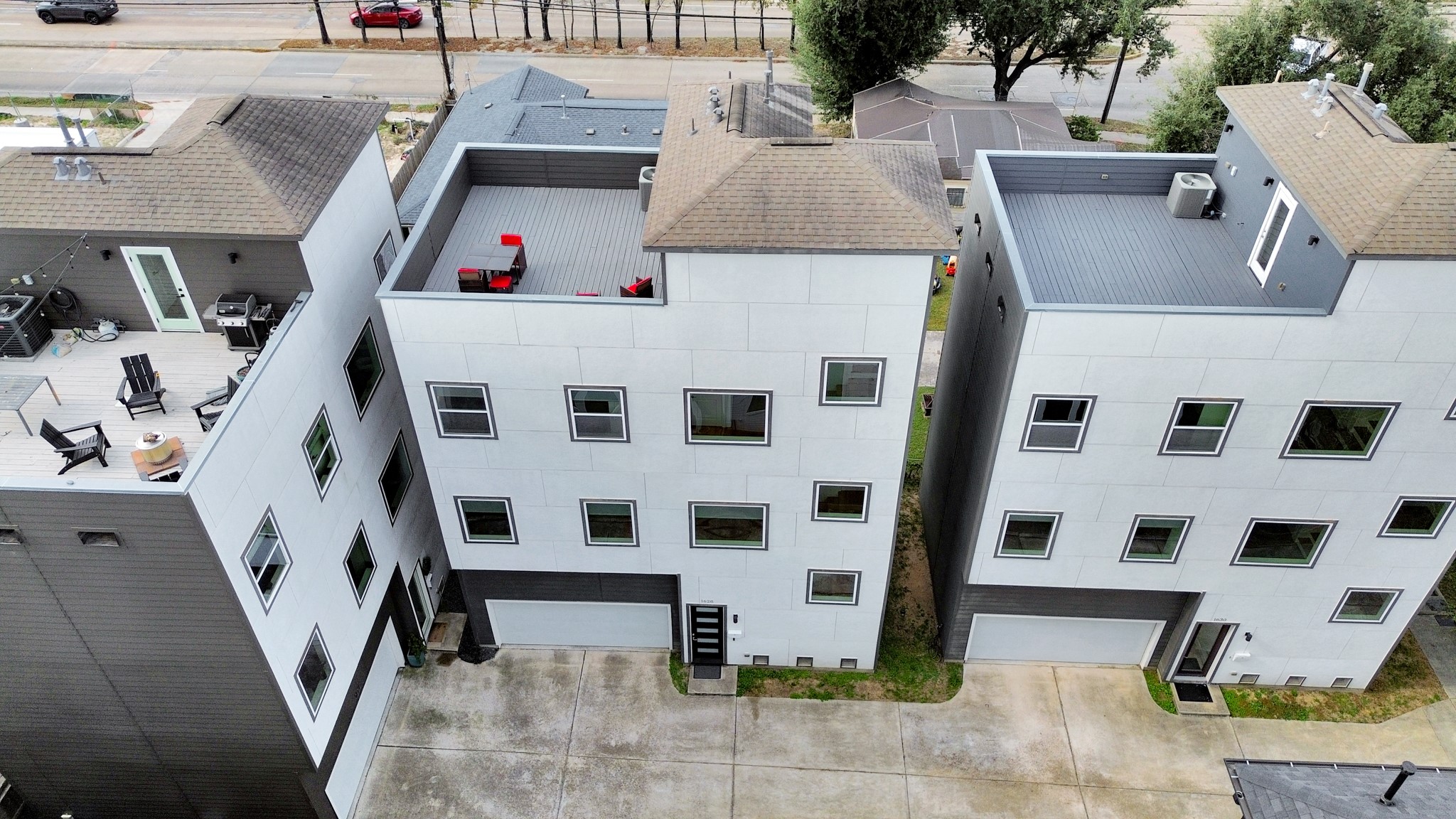 1628 West 24th Street Houston, TX 77008 - Photo 2 of 40 Experience breathtaking city views from the newly updated siding on this massive 4th-floor deck—your perfect urban oasis.