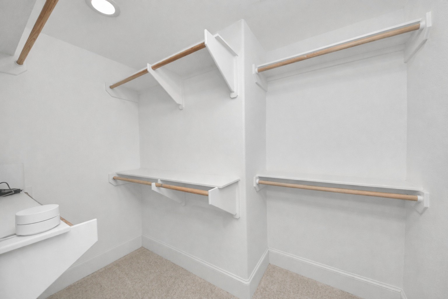 1628 West 24th Street Houston, TX 77008 - Photo 27 of 40 A spacious primary closet designed outside the bathroom, ensuring your clothes stay clean and fresh!