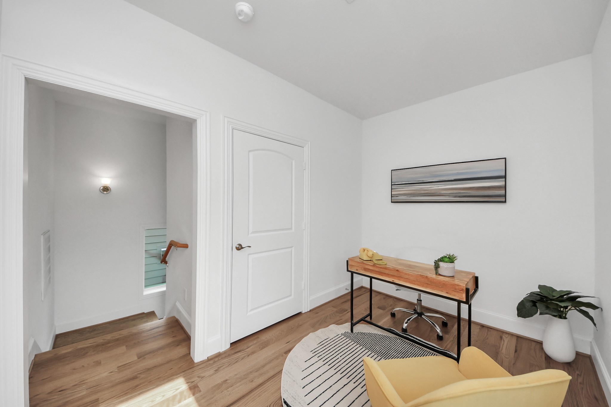 1628 West 24th Street Houston, TX 77008 - Photo 28 of 40 At the top of the stairs on the 4th floor is a flexible space that can be used as an office, workout room, yoga studio or lounge to compliment the outdoor space.