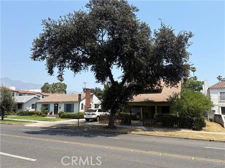 92 Allen Avenue Pasadena, CA 91106 - Photo 2 of 11 a front view of a building with a garden