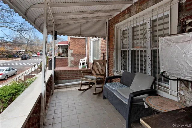 a outdoor space with patio couches and a stove
