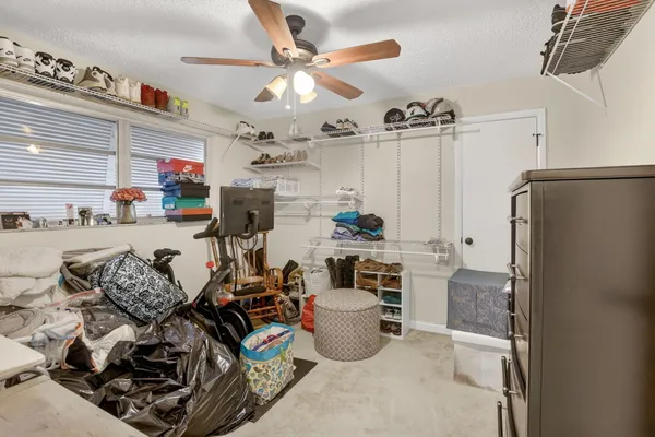 a utility room with dryer washer and other items