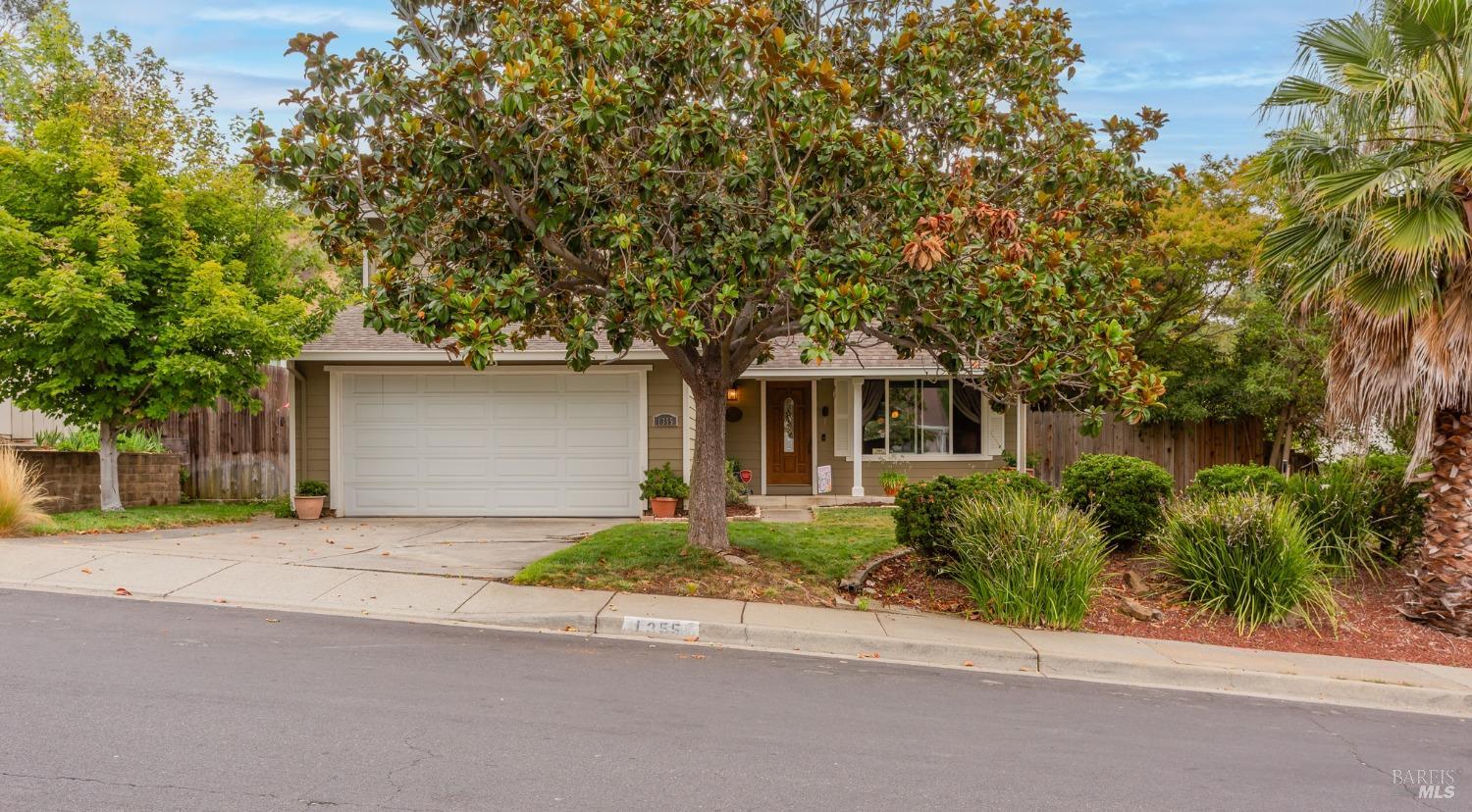 front view of a house with a garage