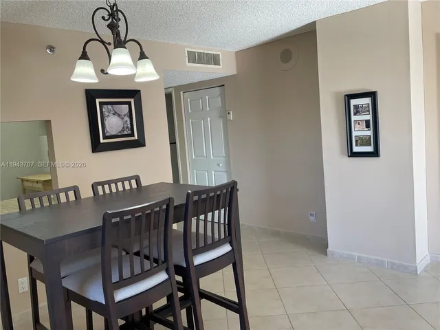 a view of a hallway with a glass door