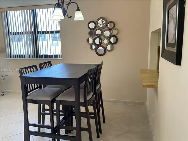 a bathroom with a sink and shower