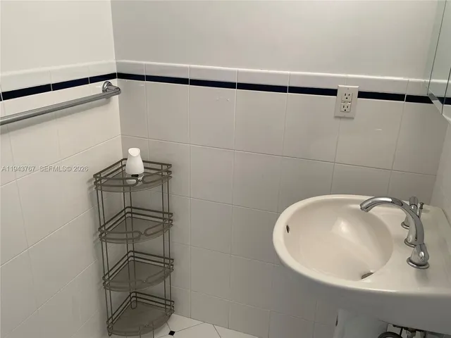 a kitchen with a stove and a microwave