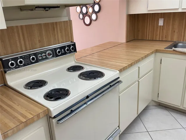 a view of storage and utility room with racks on the wall