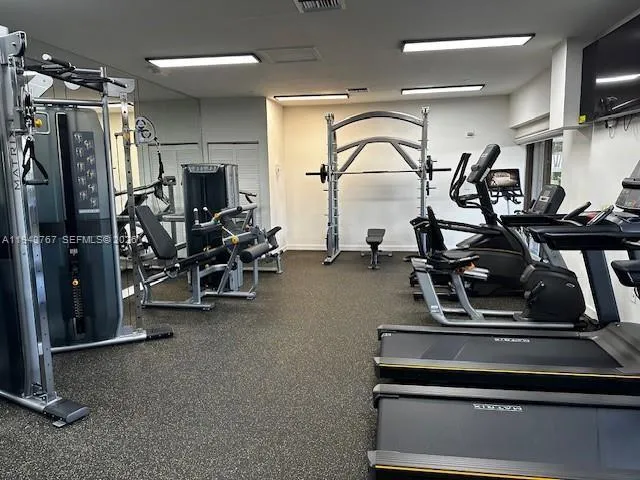 a view of a room with gym equipment