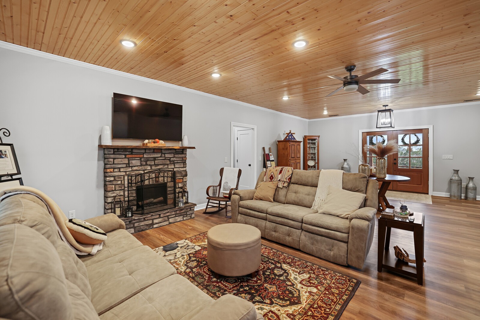 2095 Linwood Road Watertown, TN 37184 - Photo 11 of 52 a living room with fireplace furniture and a flat screen tv