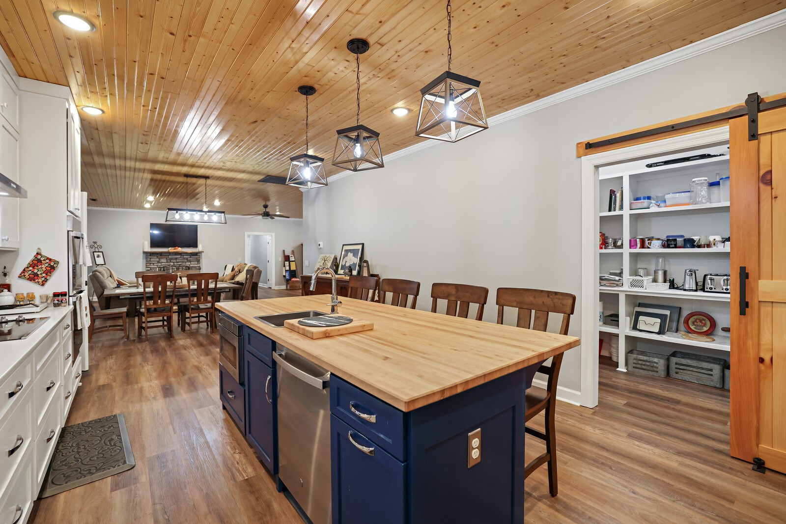 2095 Linwood Road Watertown, TN 37184 - Photo 17 of 52 an open kitchen with a table and chairs