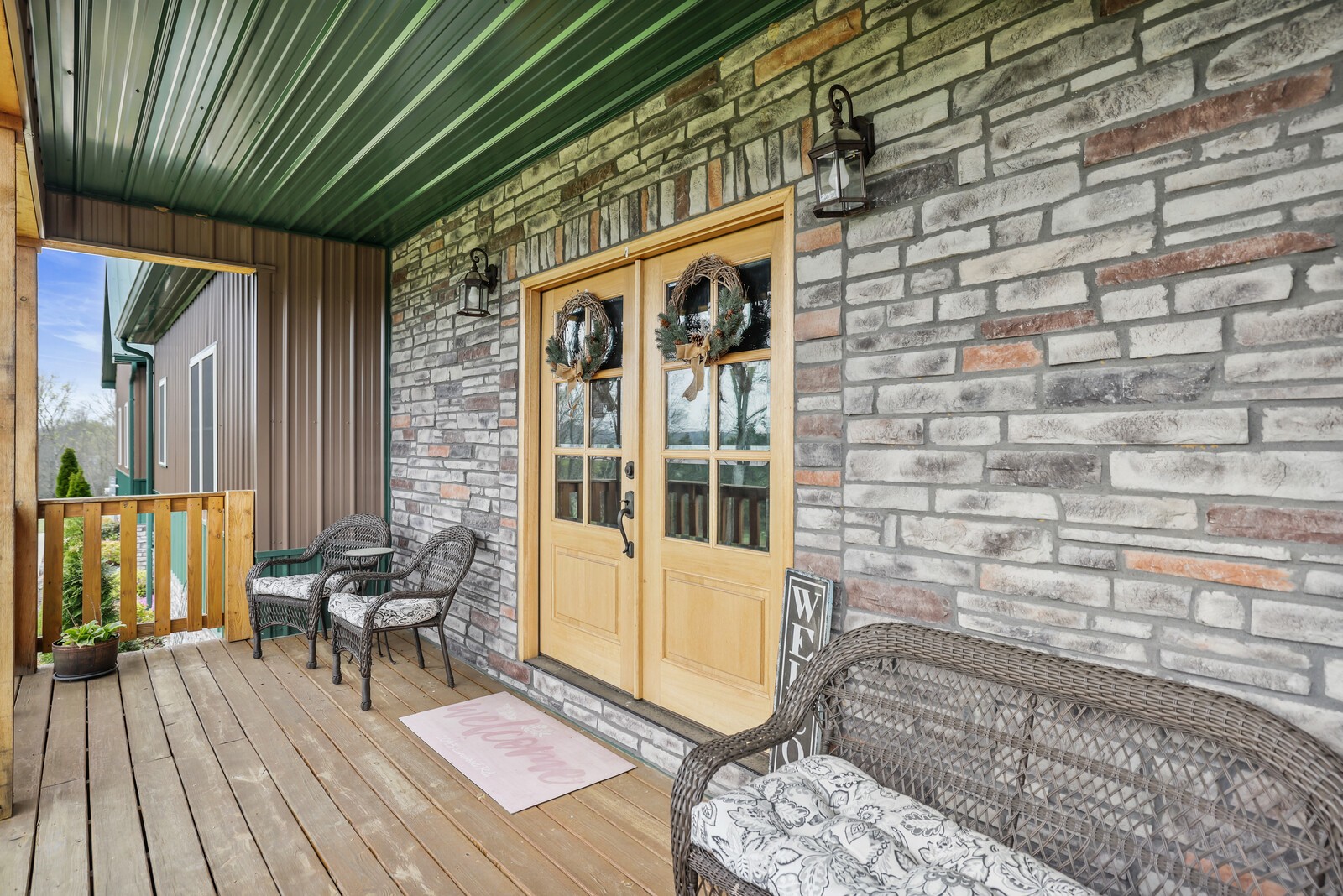 2095 Linwood Road Watertown, TN 37184 - Photo 8 of 52 a view of patio with a table and chairs and wooden floor