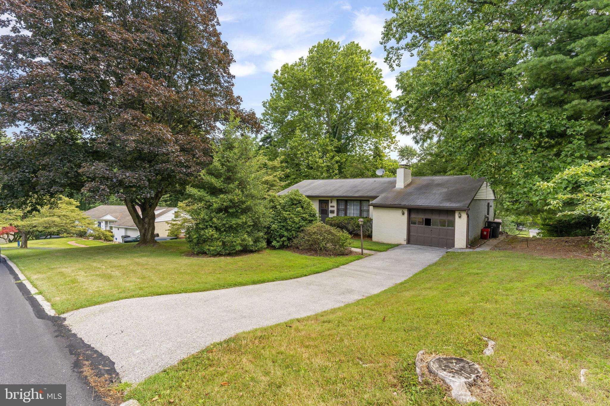 258 Dayleview Road Berwyn, PA 19312 - Photo 1 of 30 a view of a house with a yard and potted plants