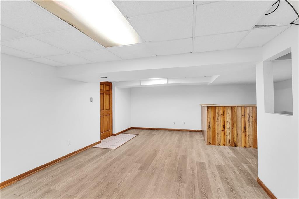 129 Shaffer Road Apollo, PA 15613 - Photo 14 of 25 a view of an empty room with wooden floor