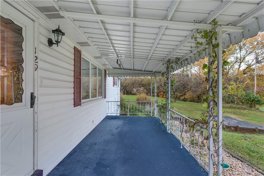 129 Shaffer Road Apollo, PA 15613 - Photo 17 of 25 a view of a porch with furniture and garden