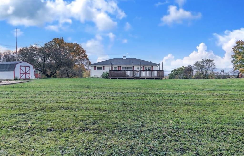 129 Shaffer Road Apollo, PA 15613 - Photo 24 of 25 a view of a big yard with a house in the background