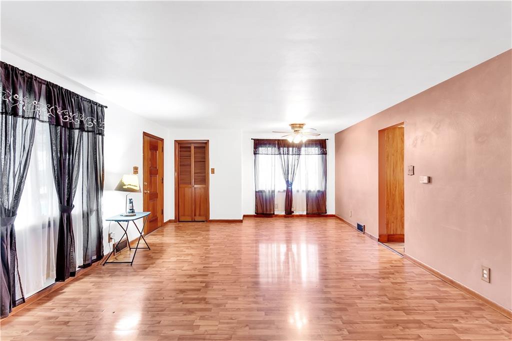 129 Shaffer Road Apollo, PA 15613 - Photo 4 of 25 wooden floor in an empty room with a window