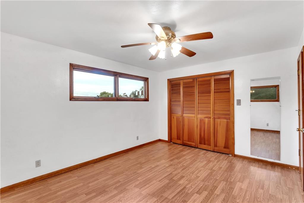 129 Shaffer Road Apollo, PA 15613 - Photo 8 of 25 a view of an empty room with wooden floor and a window