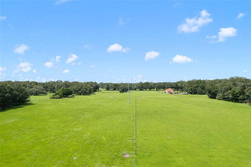 552 Cr Bushnell Bushnell, FL 33513 - Photo 2 of 21 a view of an ocean from a yard