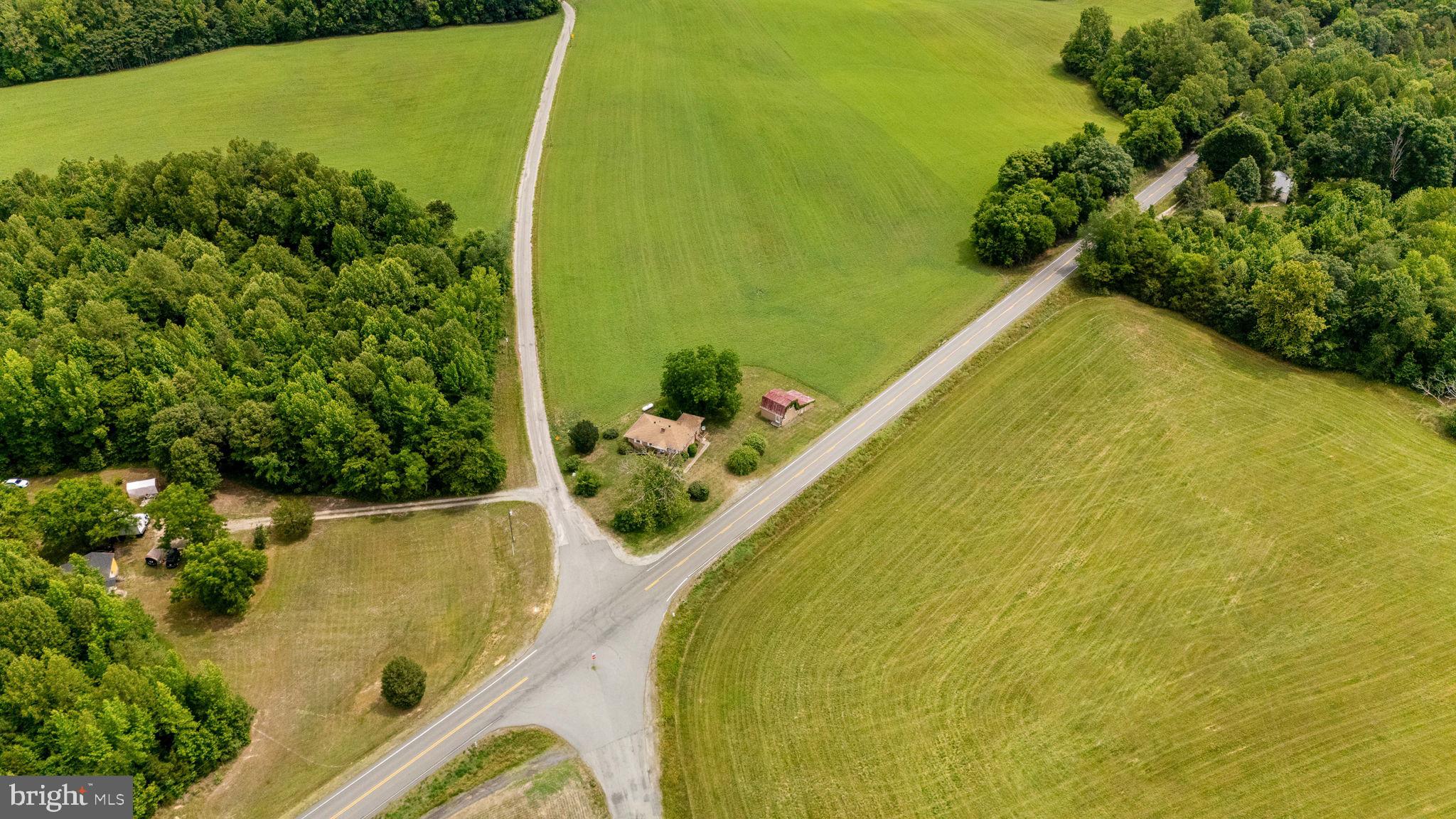 1440 Holly Farm Road Burkeville, VA 23922 - Photo 45 of 52 Serene crossroads in lush countryside.