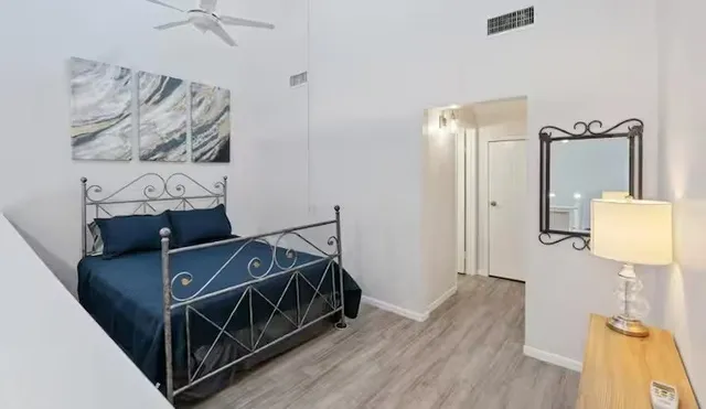 a view of a living room and bathroom