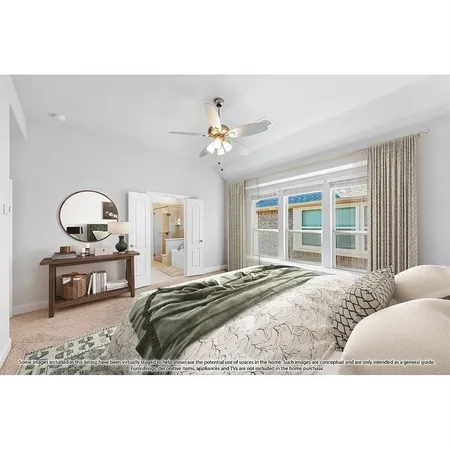 a living room with a bed furniture and a window