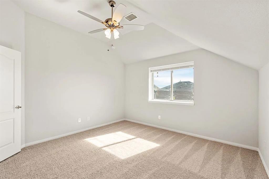 1232 Starlight Avenue Aubrey, TX 76227 - Photo 21 of 22 an empty room with a window