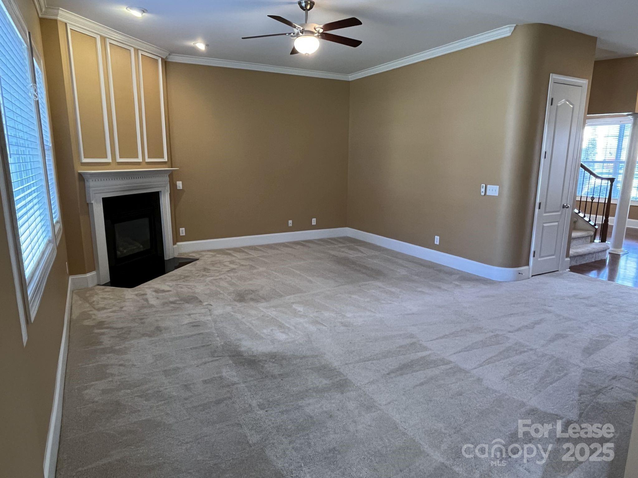 11502 Wheat Ridge Road Charlotte, NC 28277 - Photo 13 of 47 a view of a livingroom with a fireplace
