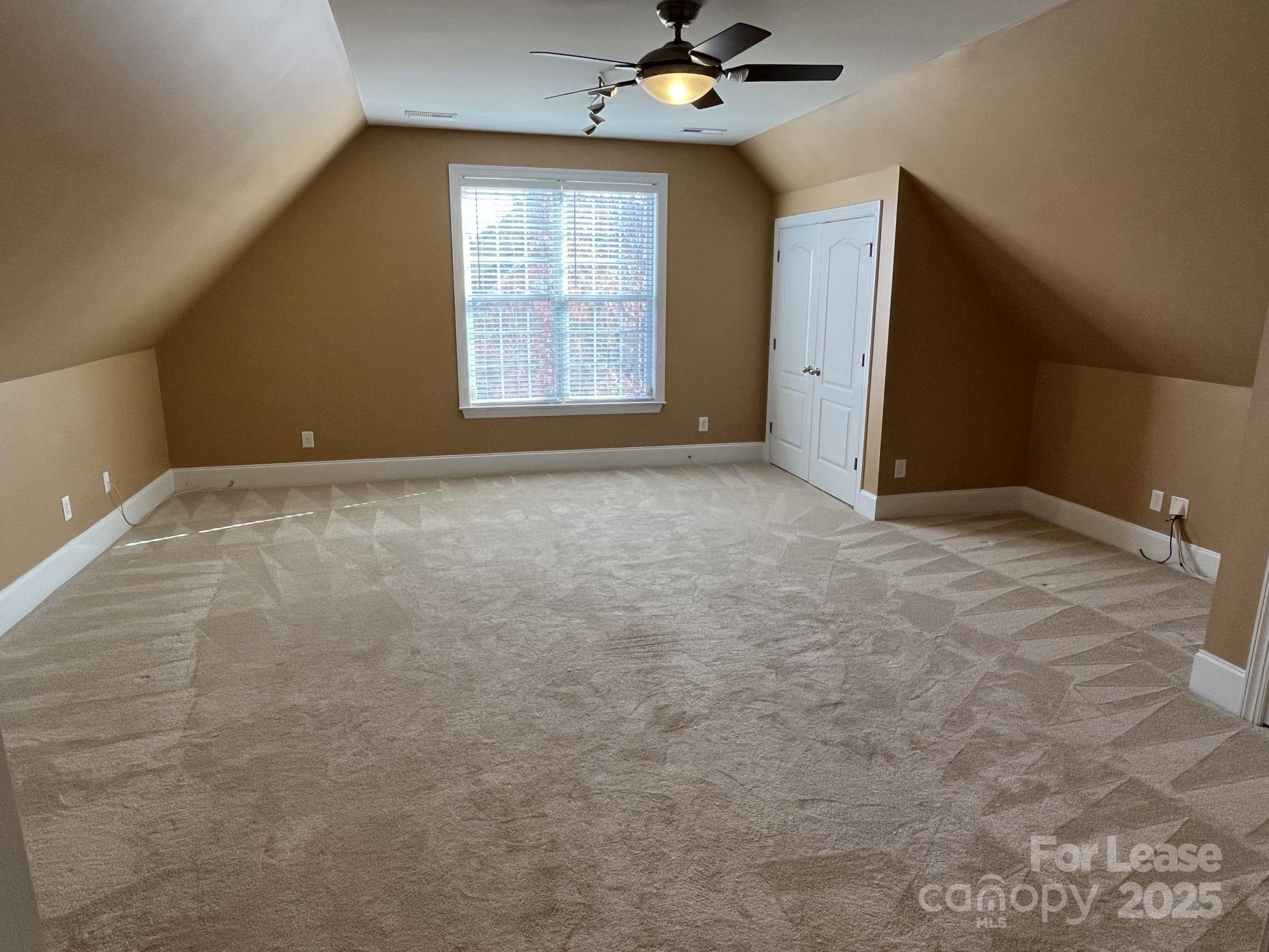 11502 Wheat Ridge Road Charlotte, NC 28277 - Photo 30 of 47 a view of an empty room with a window