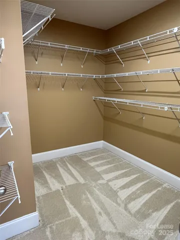 a view of a room with racks on the wall