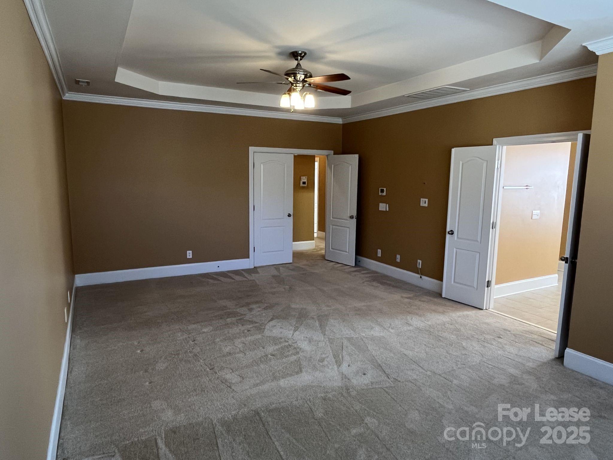 11502 Wheat Ridge Road Charlotte, NC 28277 - Photo 40 of 47 a view of a livingroom with a ceiling fan window and a chandelier
