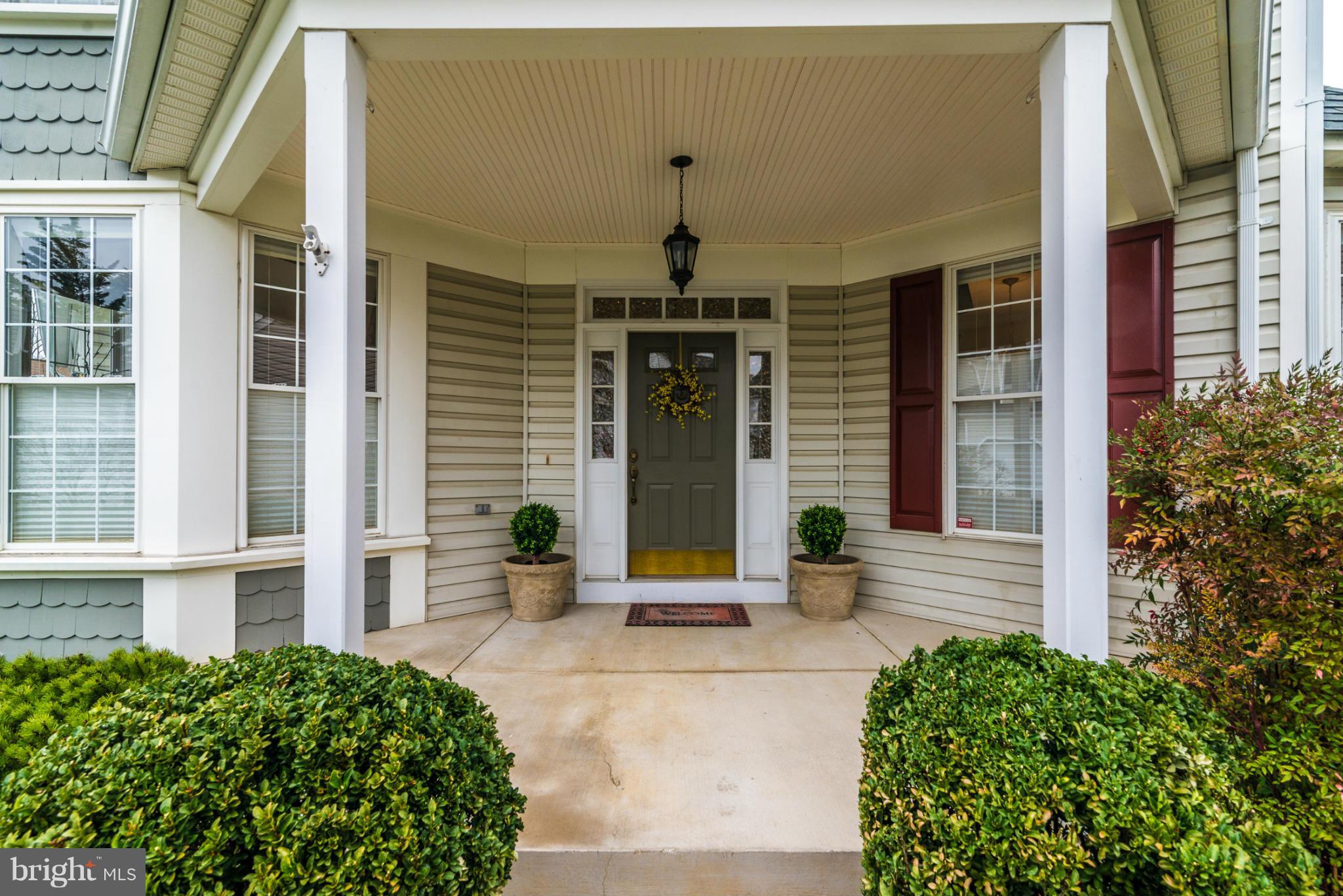 2519 Bear Den Road Frederick, MD 21701 - Photo 2 of 30 a front view of a building with potted plants